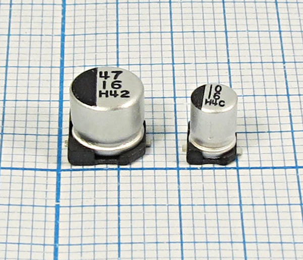 кэ   100\ 10\SMD06x06x05C2\20\+85C\Al\2C\CSM\JAMIC